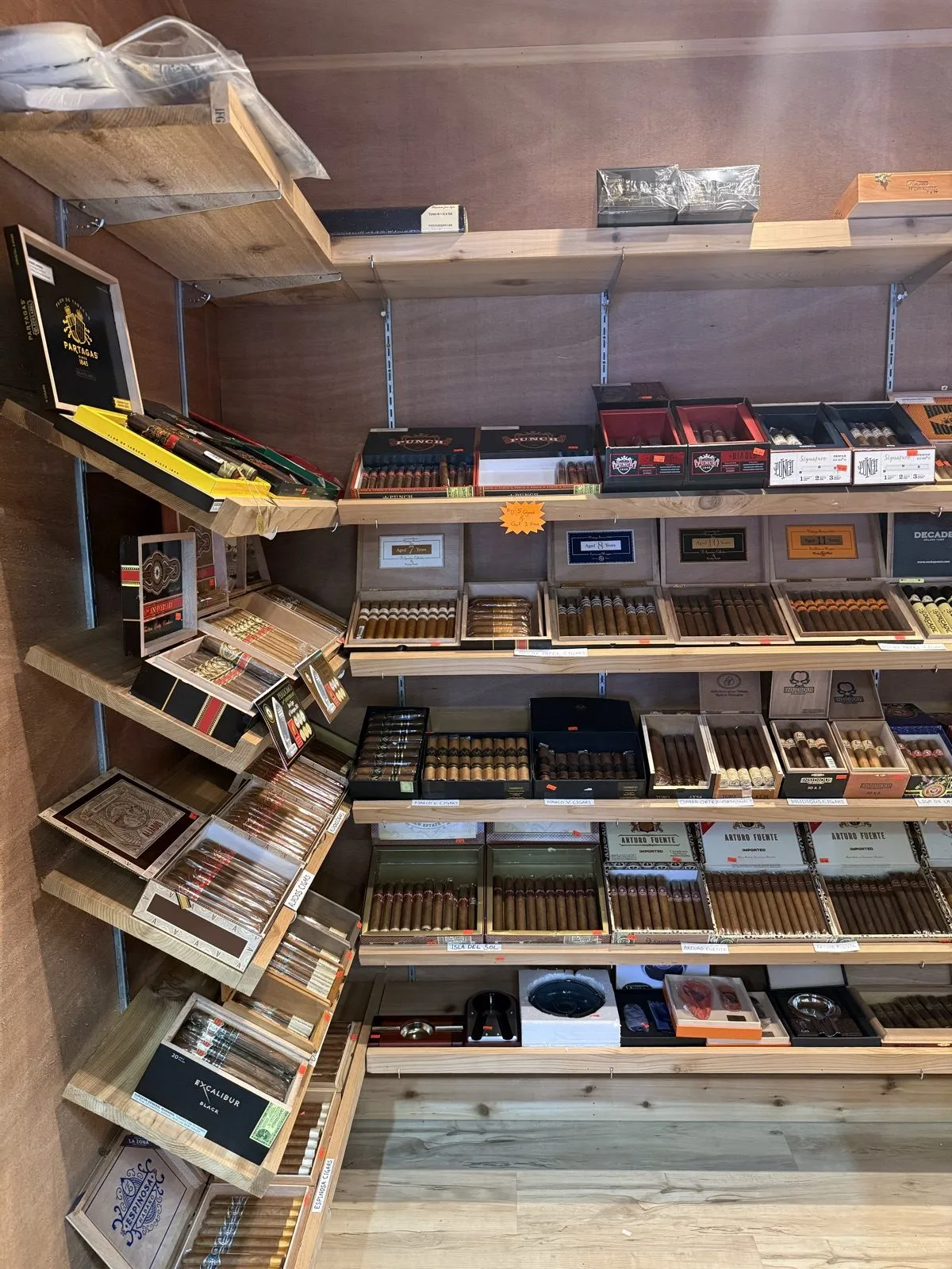Wall of premium cigars in the 212 Tobacco humidor